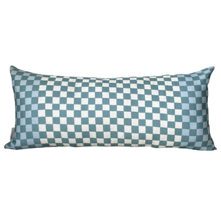 Checkered pillow with blue and white pattern on a white background