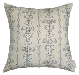 A square cushion with a floral stripe in dark blue on a natural background.